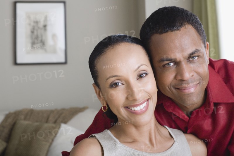Portrait of couple at home. Photo : Rob Lewine