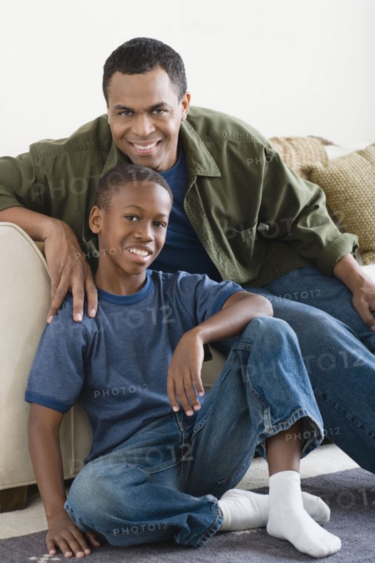 Portrait of Father and Son (12-13) at home. Photo: Rob Lewine