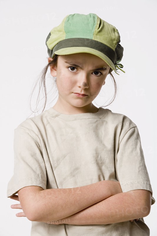 Studio portrait of sly girl (8-9). Photo: Rob Lewine