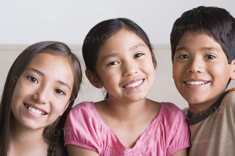 Portrait of happy children (8-9, 10-11). Photo: Rob Lewine