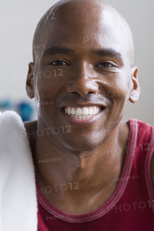 Portrait of male athlete smiling. Photo : Rob Lewine