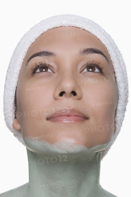 Portrait of attractive woman enjoying spa treatment. Photo : Rob Lewine