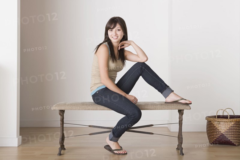 Woman sitting on bench. Photo : Rob Lewine