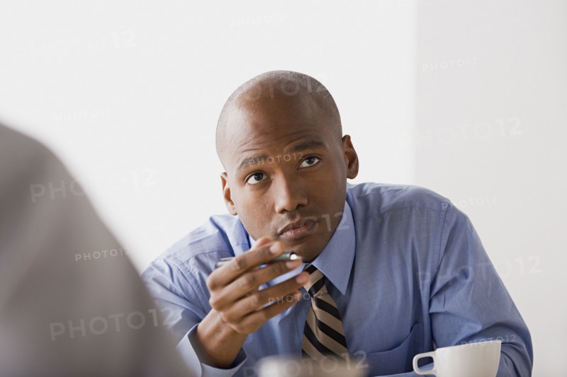 Businessman in office. Photo: Rob Lewine