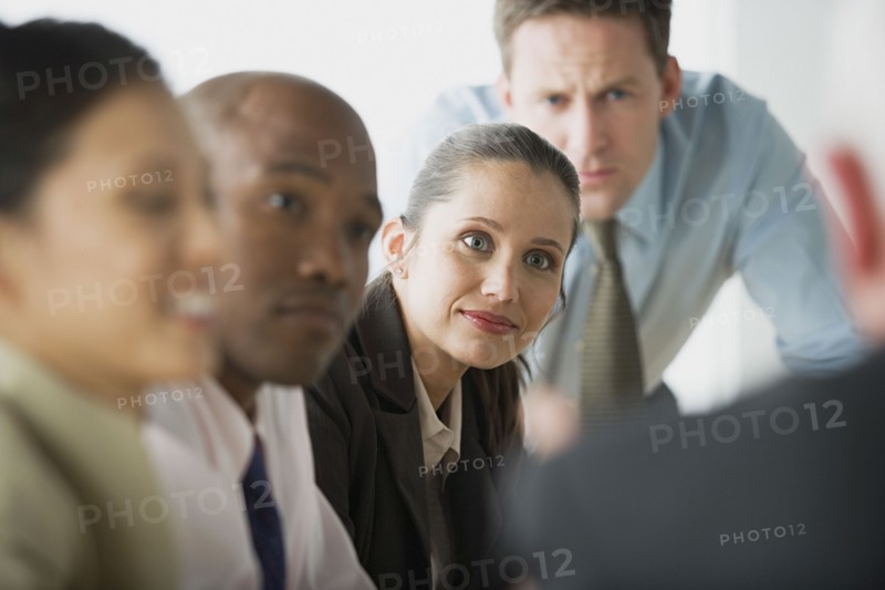 Portrait of business people in office. Photo: Rob Lewine