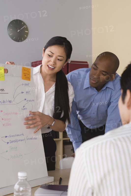 Business people working in office. Photo : Rob Lewine