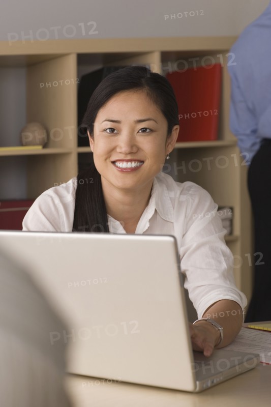 Portrait of businesswoman in office. Photo : Rob Lewine
