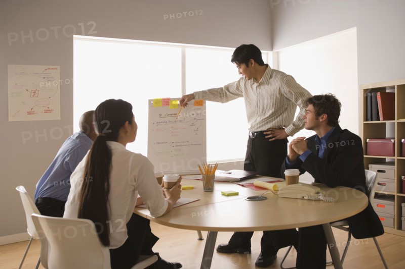 Business people working in office. Photo : Rob Lewine