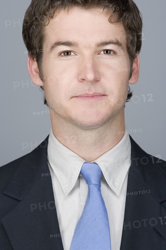 Portrait of young businessman. Photo : Rob Lewine