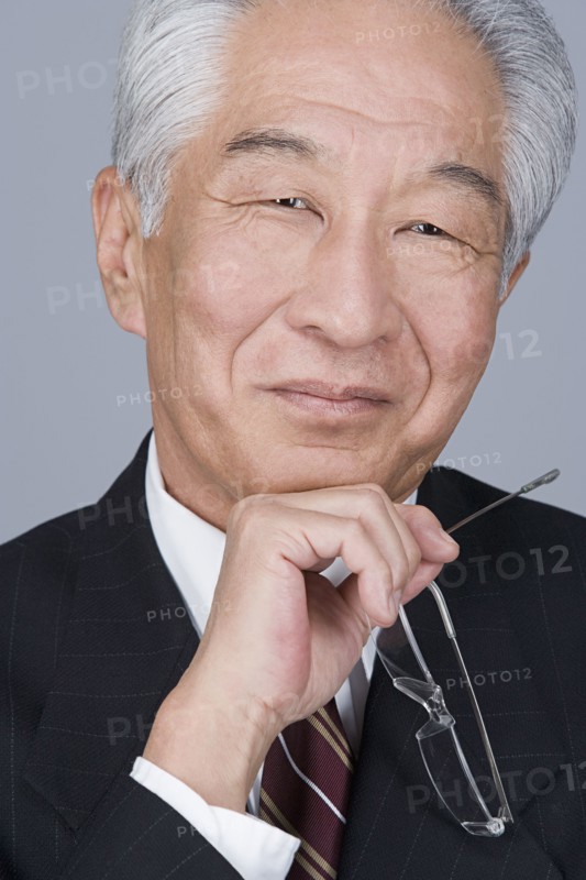 Portrait of senior businessman. Photo : Rob Lewine