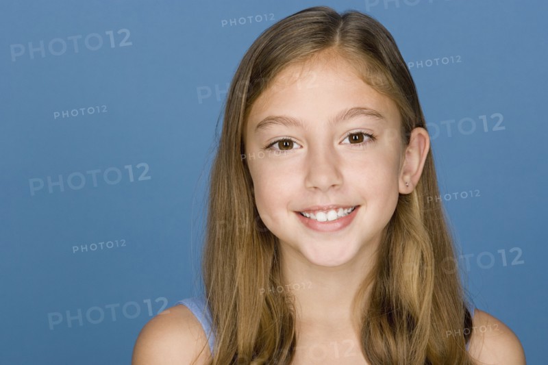 Portrait of happy girl (8-9). Photo : Rob Lewine