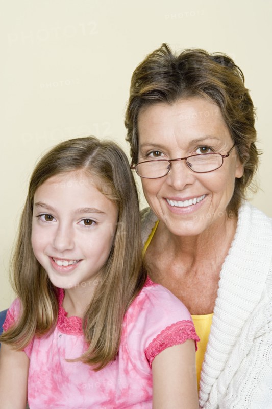 Portrait of grandmother and granddaughter (8-9). Photo : Rob Lewine