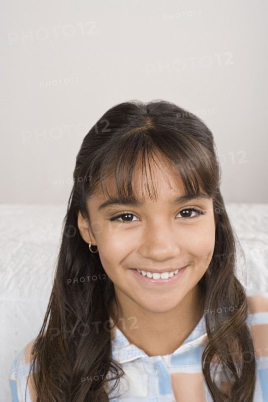 Portrait of smiling girl (10-11) . Photo: Rob Lewine