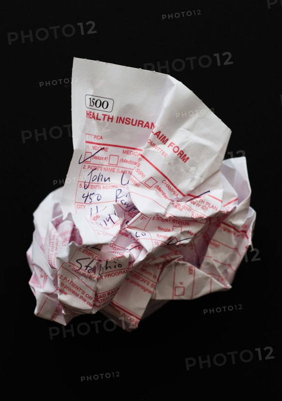 Studio shot of crumpled document.
