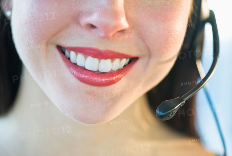 Close-up of female customer service representative.