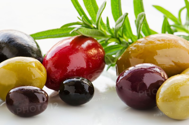 Close-up of various olives, studio shot.