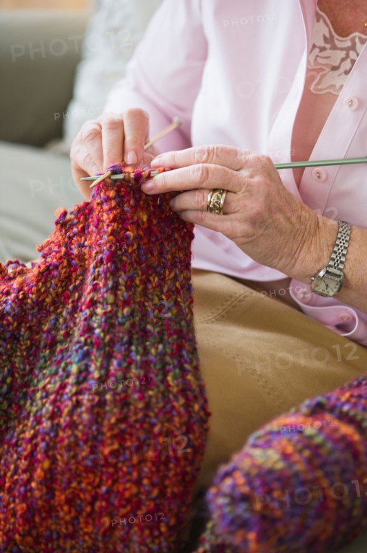 Senior woman knitting, close-up.