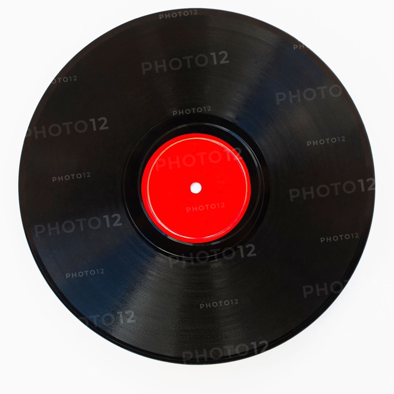 Vinyl record on white background, studio shot.