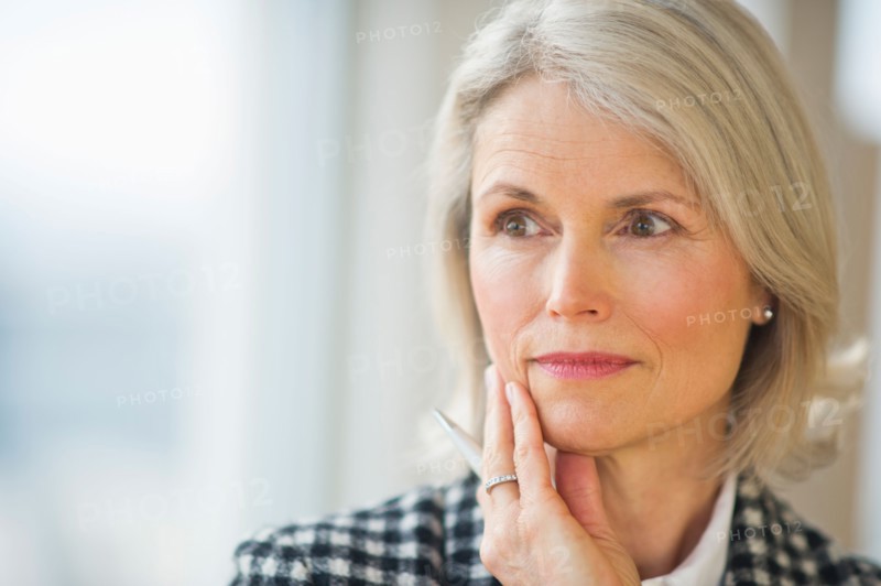 Portrait of senior businesswoman .