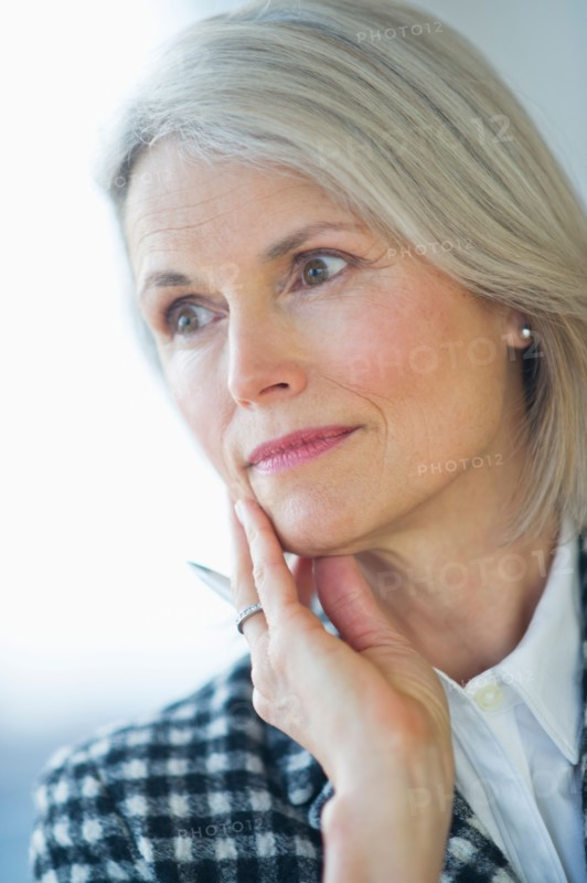 Portrait of senior businesswoman .