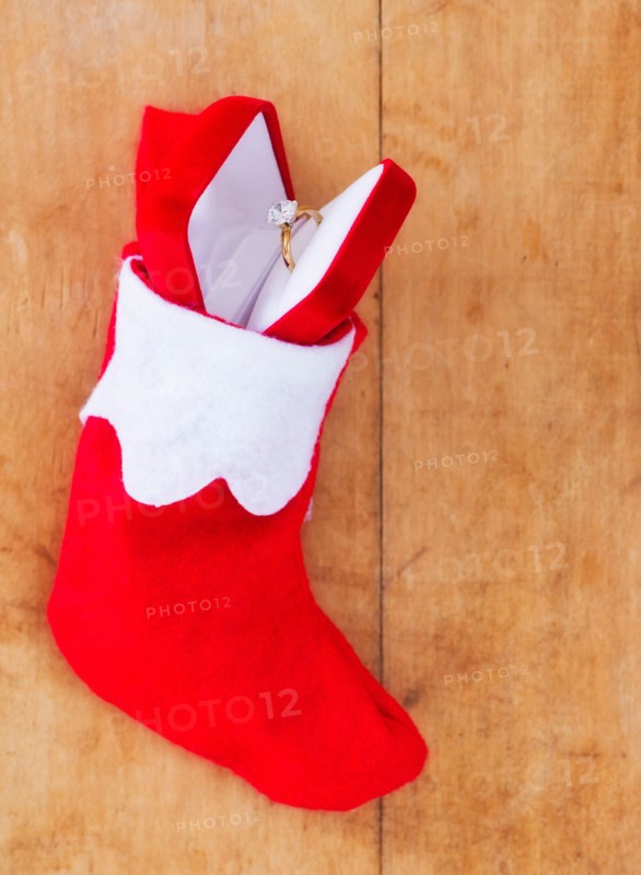 Christmas stocking with engagement ring. Photo : Daniel Grill