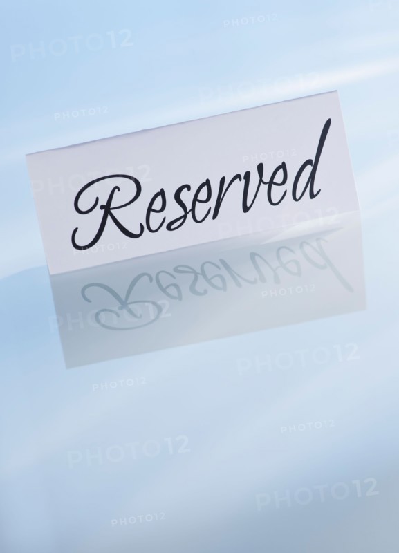 Studio shot of reserved sign. Photo : Daniel Grill