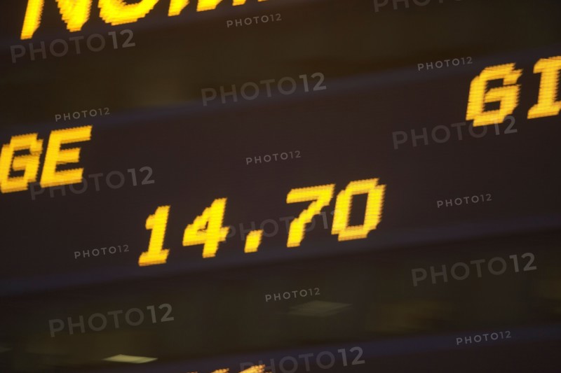 Usa, New York State, New York City, Times Square, Stock Quotron, close-up of Ticker Tape Machine. Photo : fotog