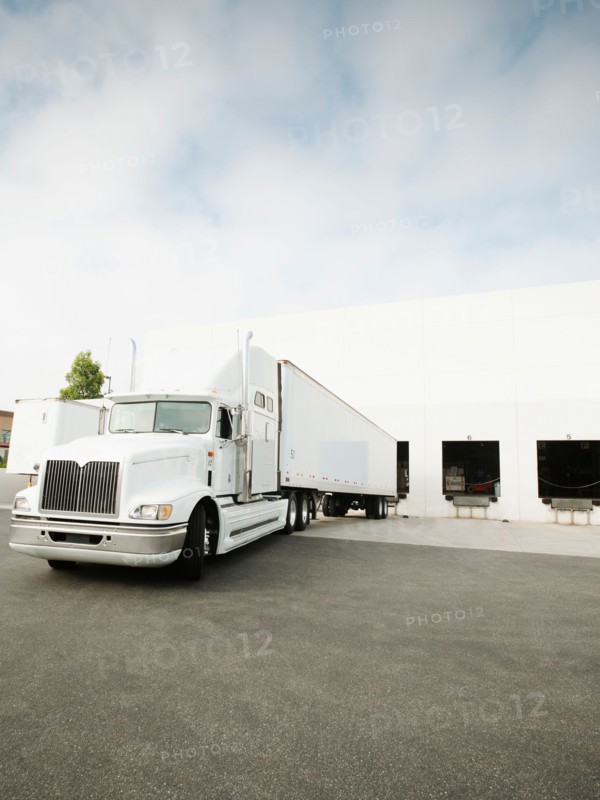 Truck loading in warehouse.