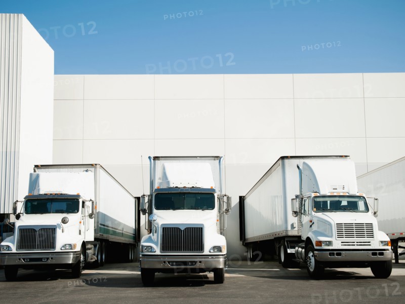 Trucks and warehouse.