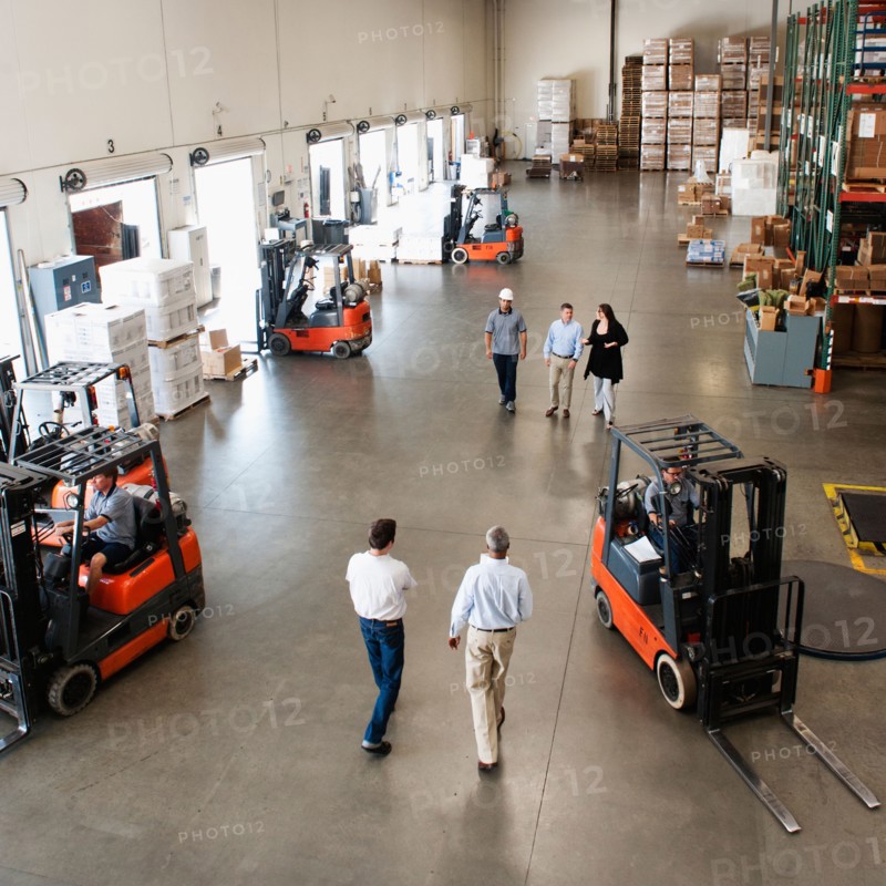 People working in warehouse.