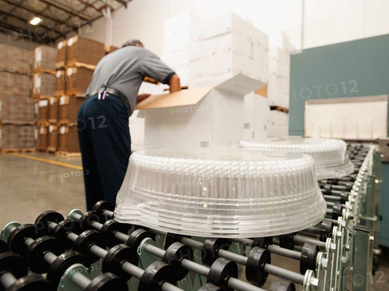 Warehouse worker assembling merchandise.