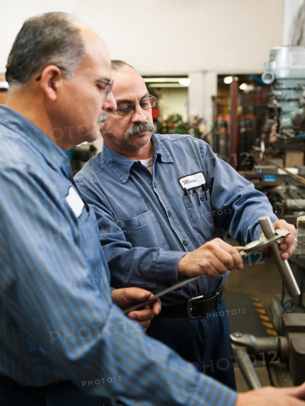 Skilled workers in factory.