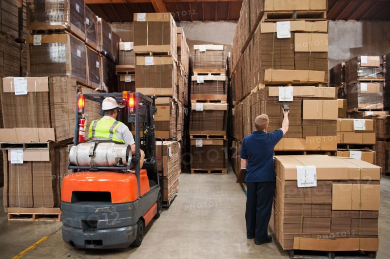 People working in warehouse.