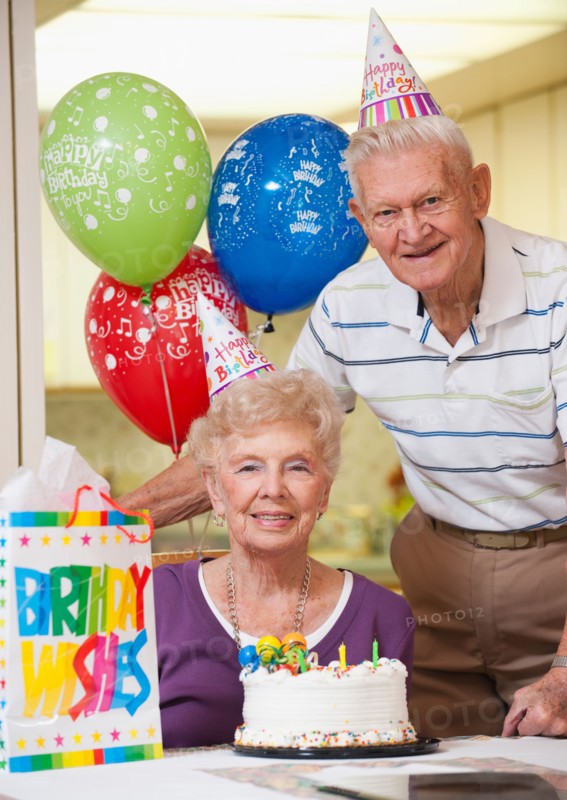 Senior couple celebrating birthday.