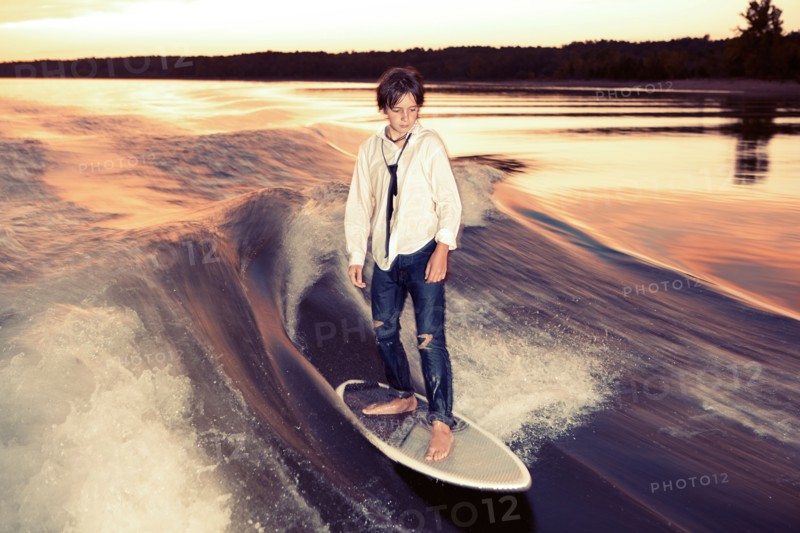 Boy wakeboarding on Lake Greeson. Photo : King Lawrence