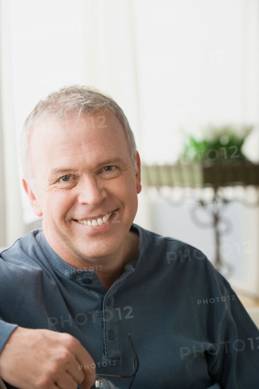 Portrait of smiling mature man. Photo : Rob Lewine