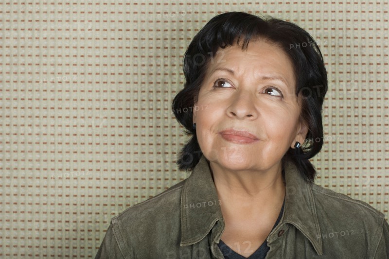 Portrait of older woman lost in thoughts. Photo : Rob Lewine