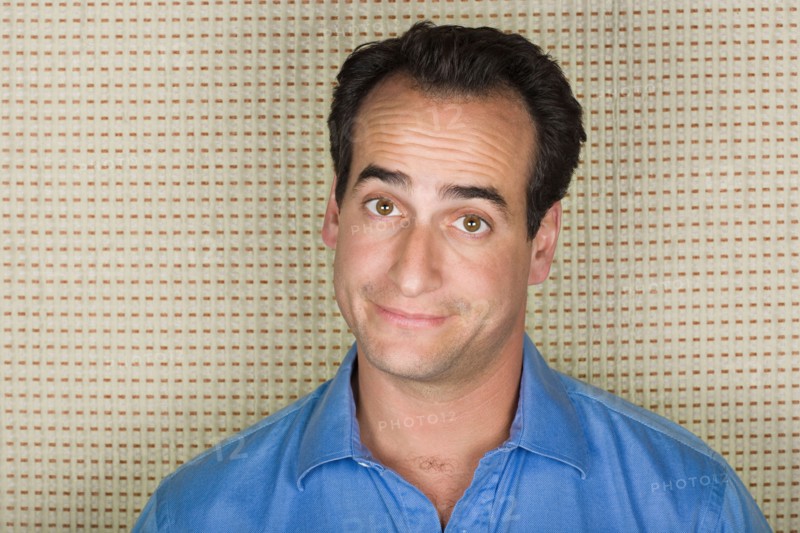 Studio portrait of mid adult man. Photo : Rob Lewine