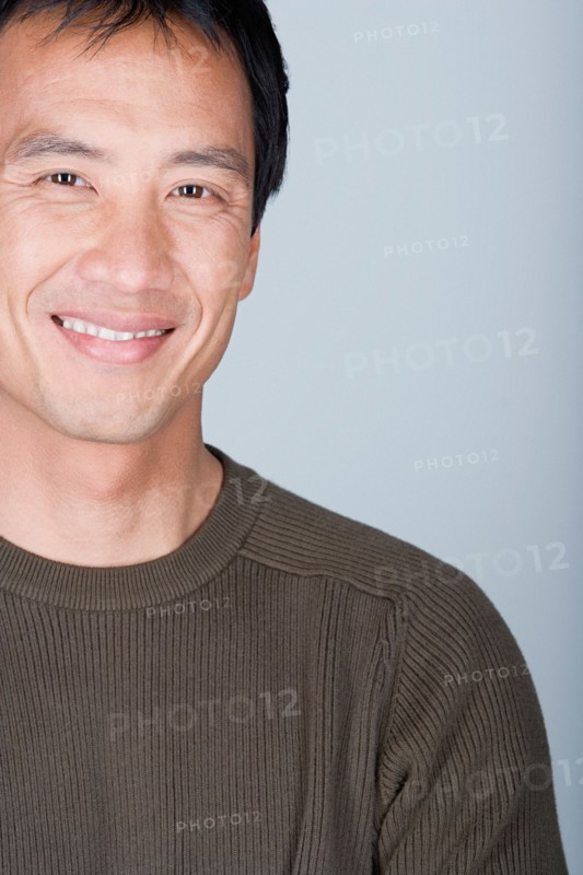 Studio shot portrait of mature man, head and shoulders. Photo : Rob Lewine