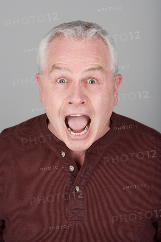 Studio portrait of scared senior man. Photo : Rob Lewine