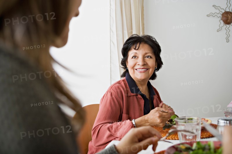 Family having meal together. Photo : Rob Lewine