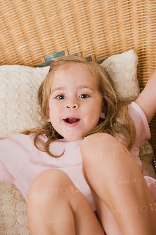 Portrait of playful girl. Photo : Rob Lewine