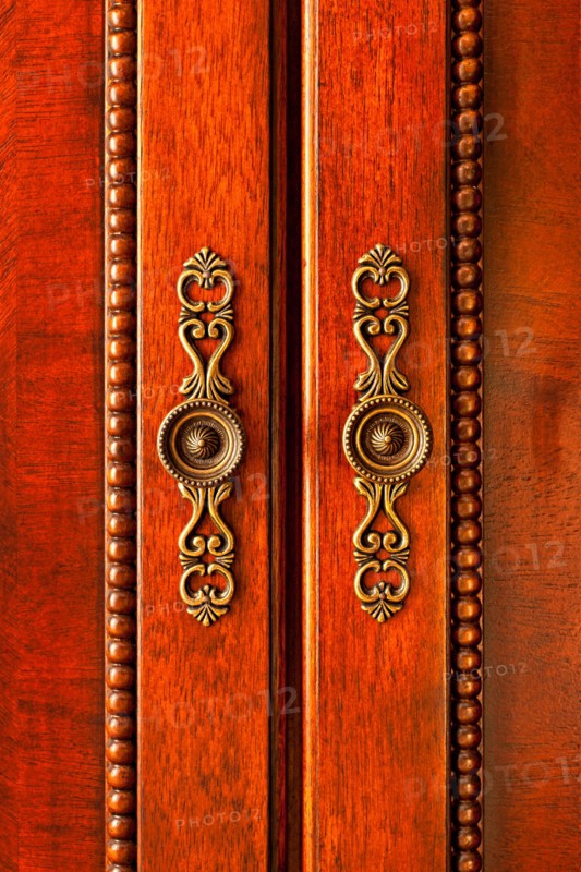 Close-up of antique cabinet's door. Photo :  Elena Elisseeva