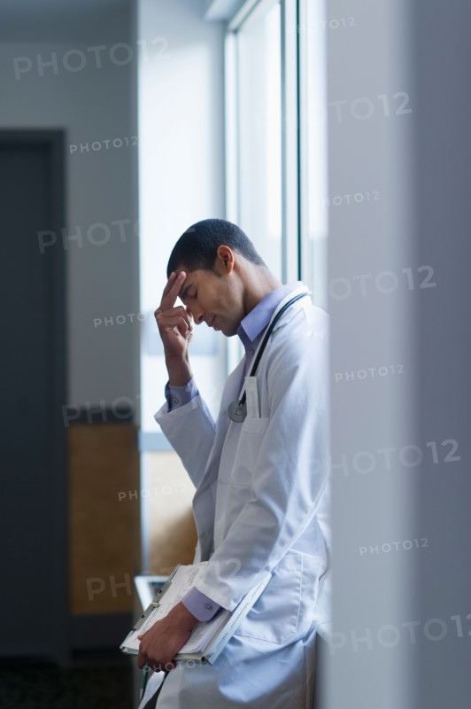 Doctor in corridor.