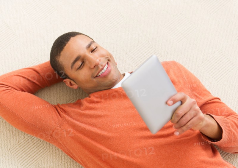 Man reading e-book.