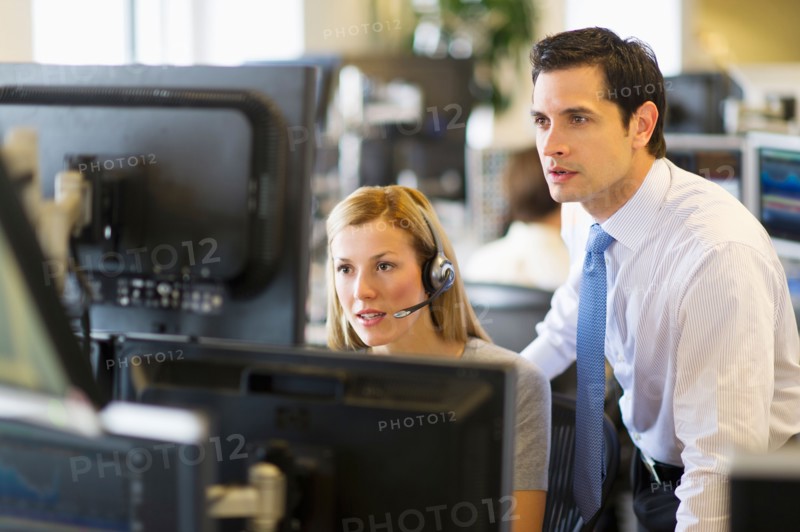 Traders at trading desk.