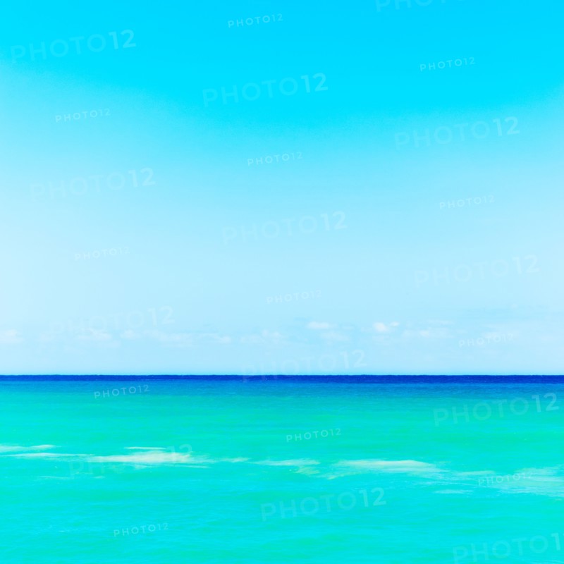 Seascape with blue sky.