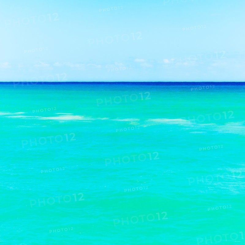 Seascape with blue sky.