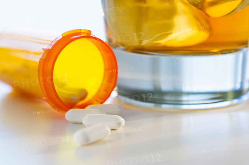 Pills and alcohol, studio shot.