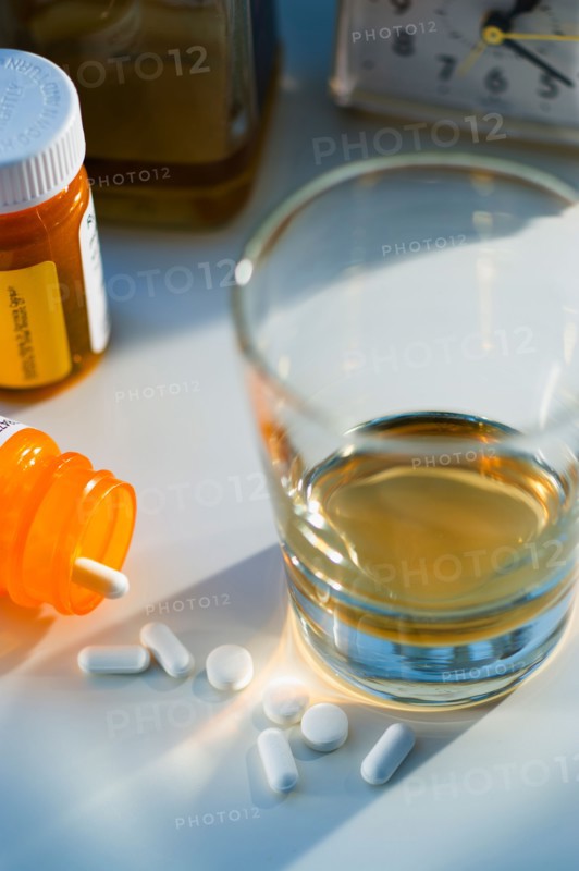 Pills and alcohol, studio shot.